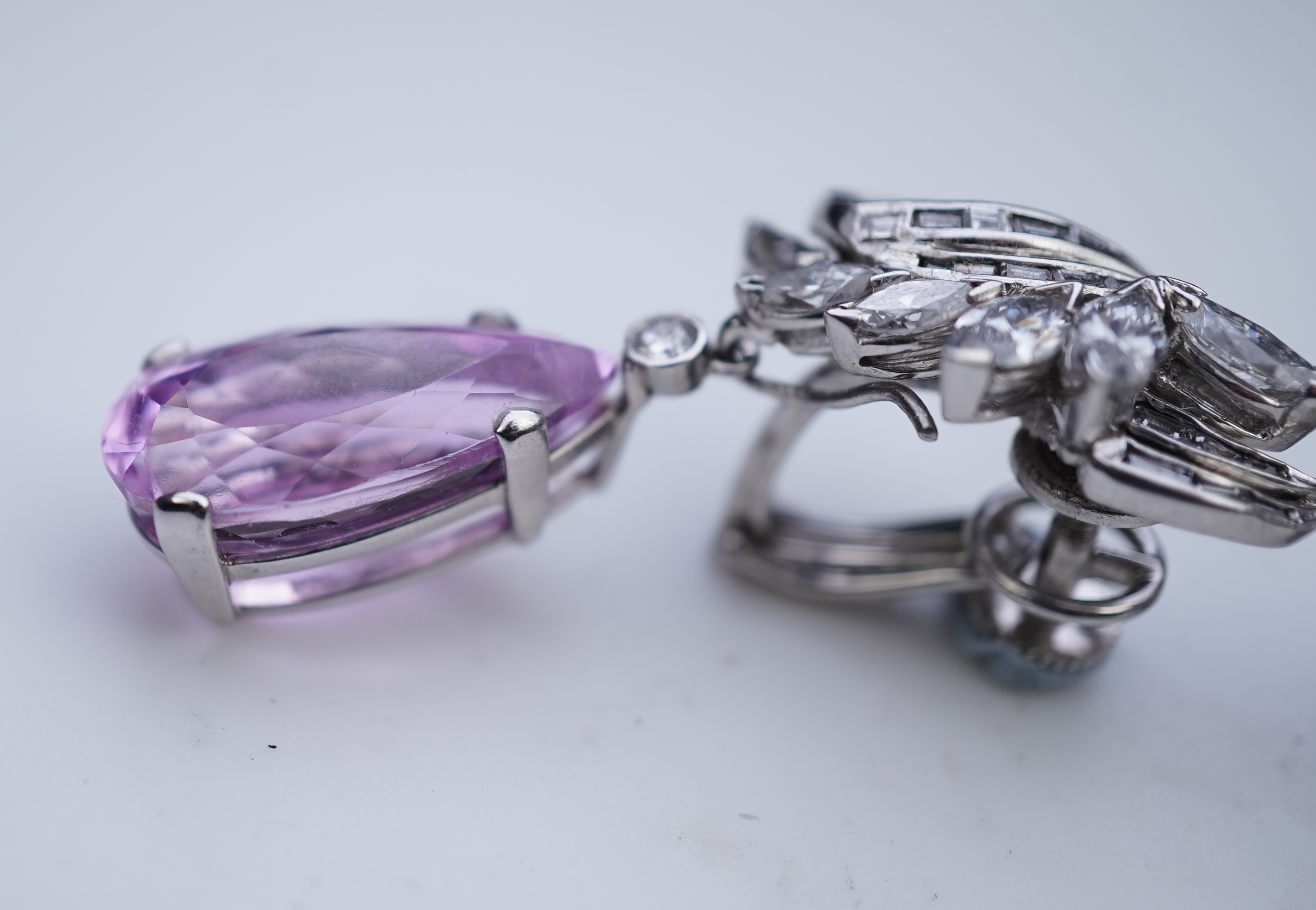 An attractive pair of 'day and night' kunzite and diamond ear clips